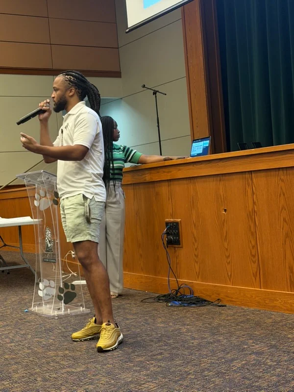 Behind the mic at a school event